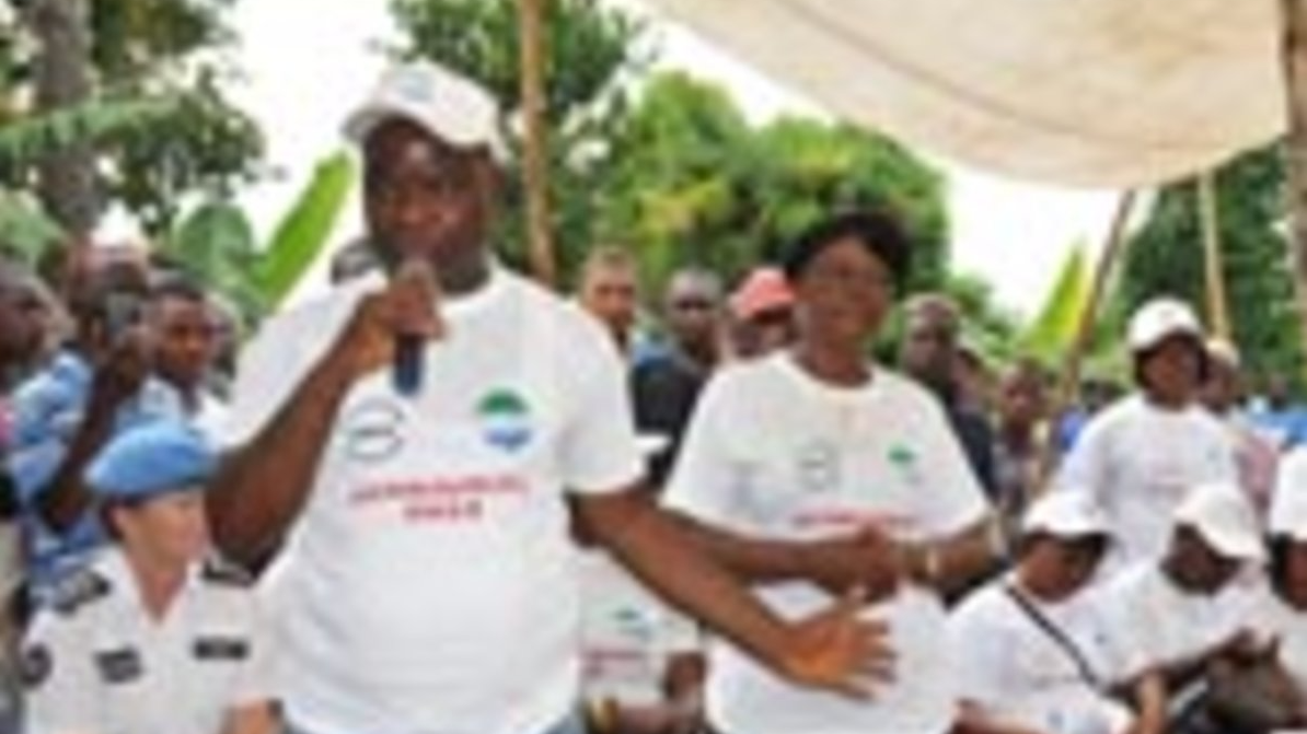 In a village in the Kono district on Monday, Jens Anders Toyberg-Frandzen, the Secretary-General's Executive Representative, speaks at an outdoor event by hundreds of school children of all ages.